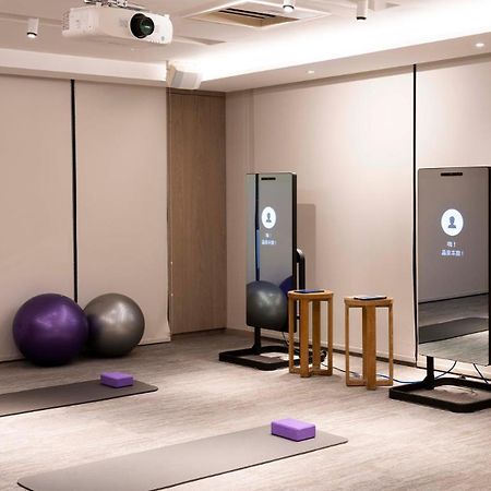 ホテル ウェルスプリング バイ シルクス 礁渓郷 エクステリア 写真 A Mirror home gym