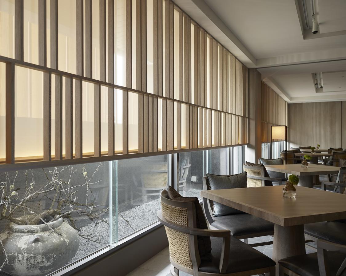 ホテル ウェルスプリング バイ シルクス 礁渓郷 エクステリア 写真 The interior of the restaurant