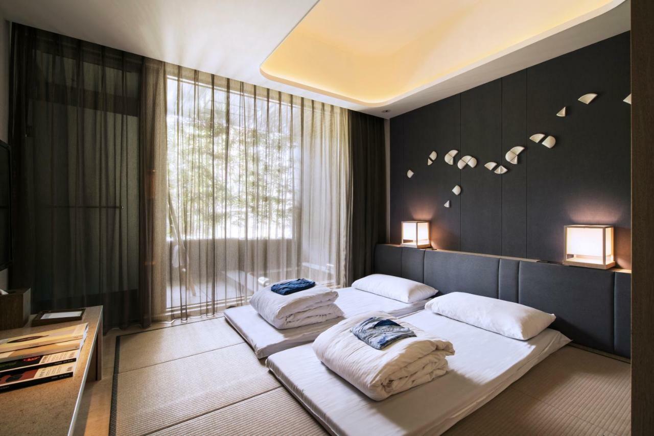 ホテル ウェルスプリング バイ シルクス 礁渓郷 エクステリア 写真 A room at the hotel